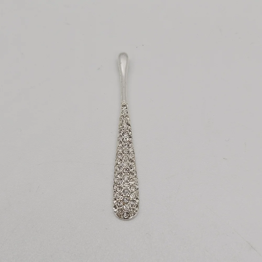 silver tone long skinny teardrop pendant with rhinestones
